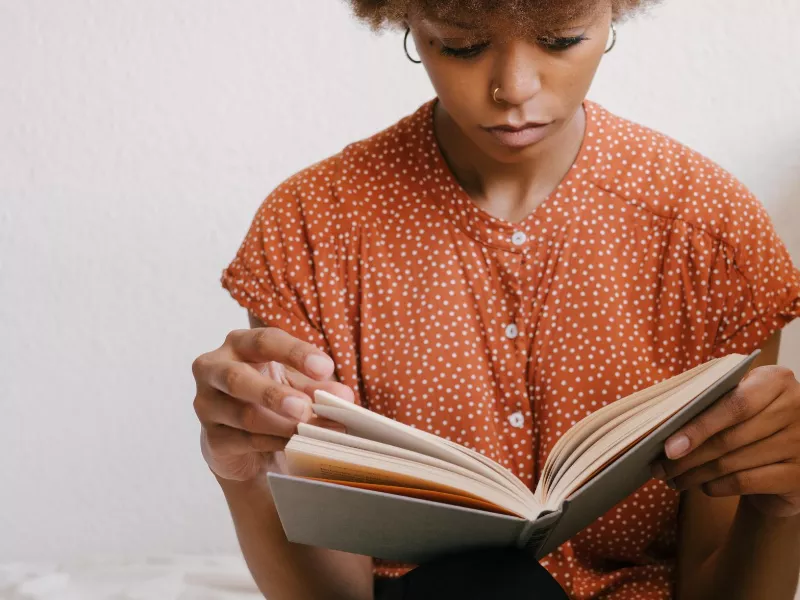 woman reading book