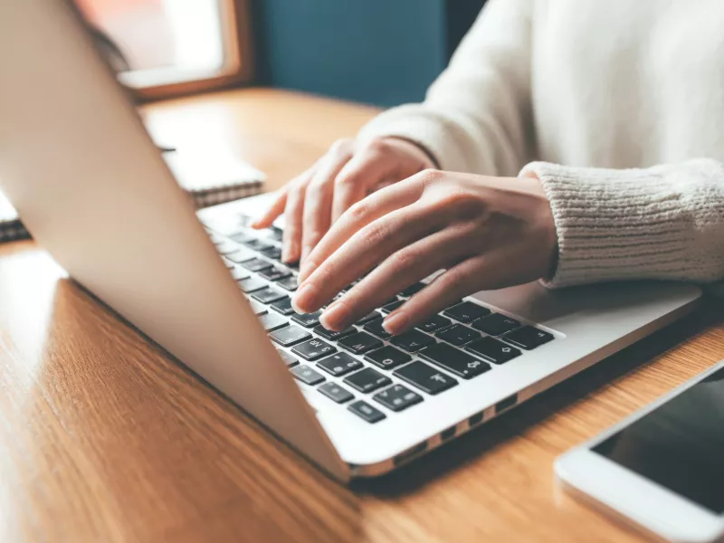 woman using laptop