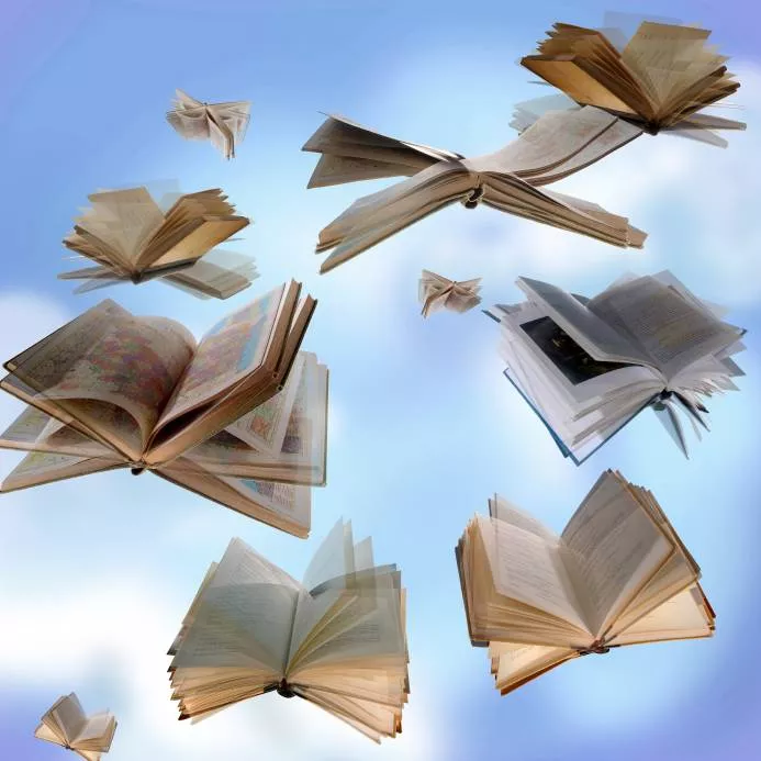 books flying through the air