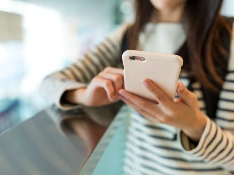 Woman using smartphone