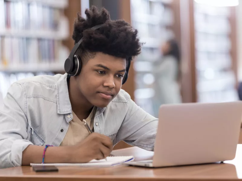student working on laptop